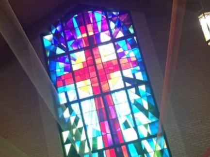 Stained Glass Window of Rainbow Cross